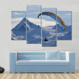 Paragliding Over Mountain In Winter Canvas Wall Art
